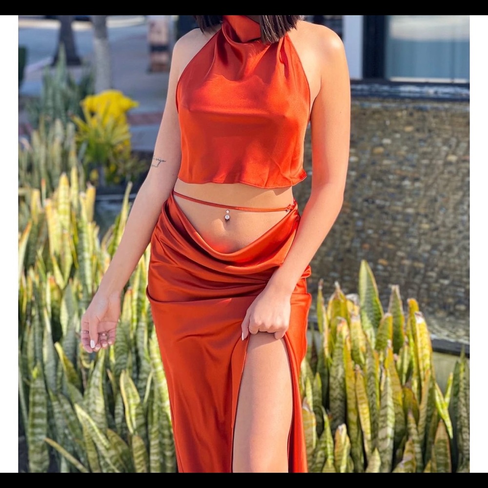 Beautiful satin halter top skirt set in burnt orange.
